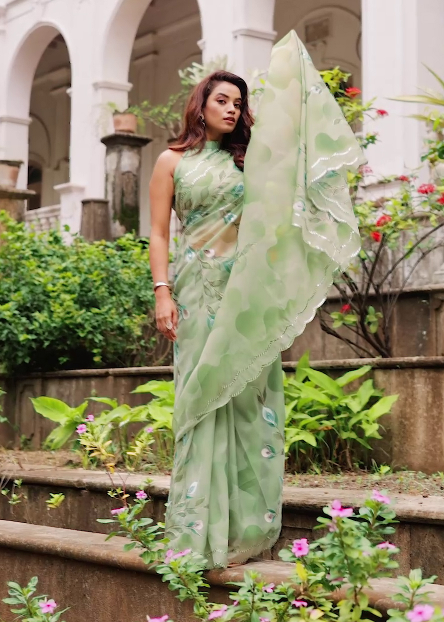 A selection of printed sarees designed for engagement ceremonies, each with unique patterns and stylish designs