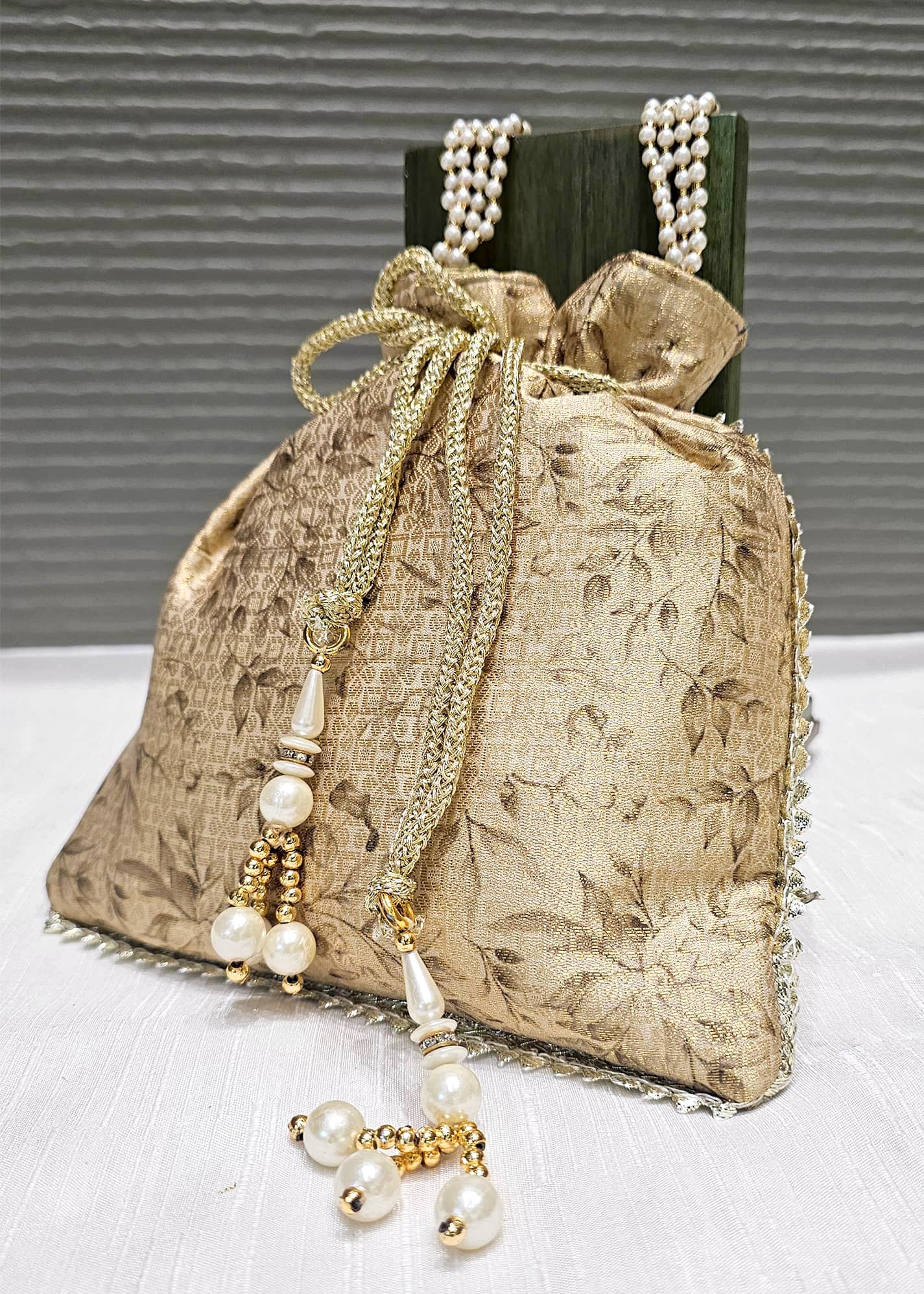 Cream Digital Printed Woven Zari Art Silk Ethnic Potli Bag with Pearl String Handle Full Image