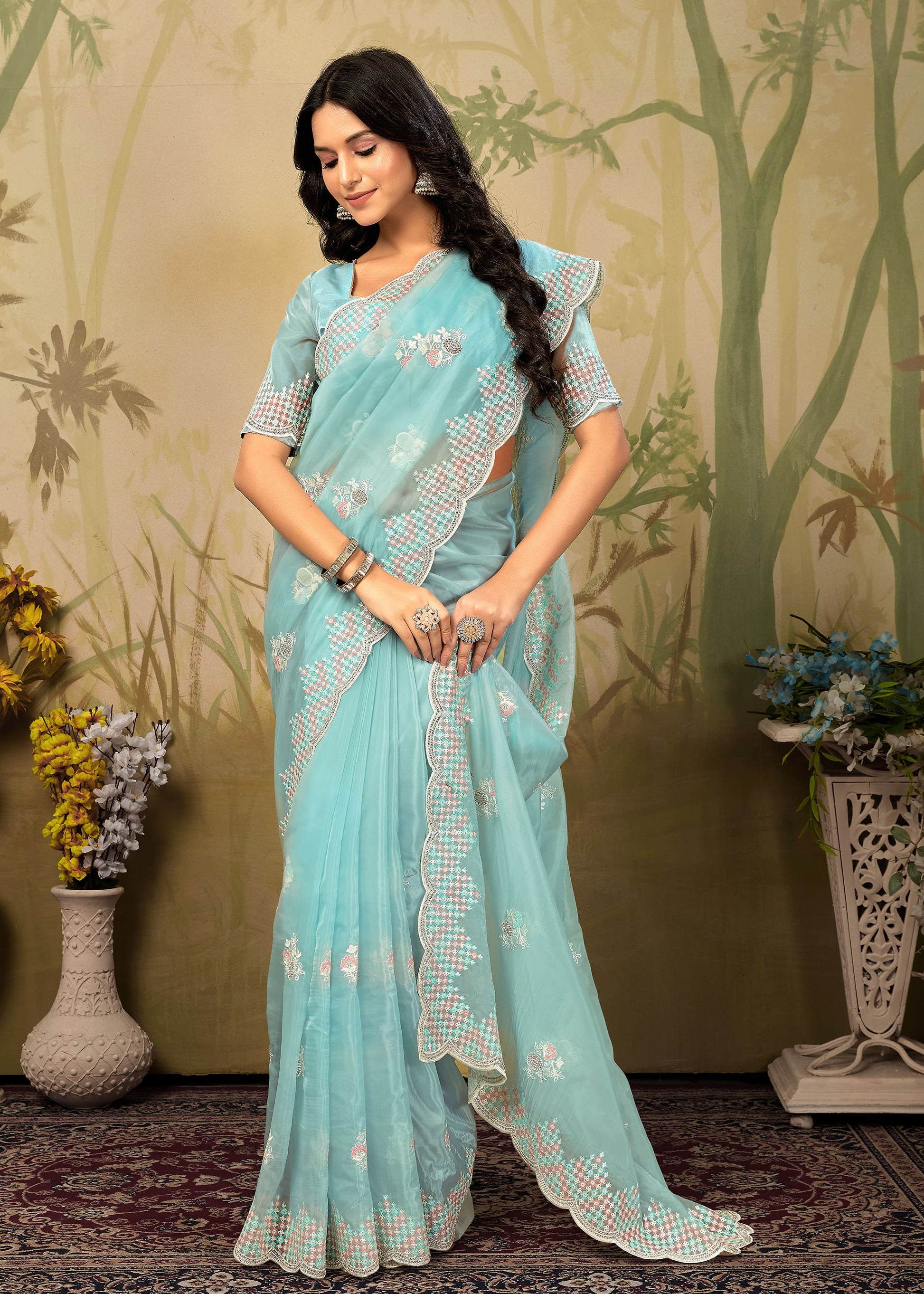 Fine Organza Saree in Soft Sky Blue with Intricate Embroidery and a Luxe Stone Cutwork Border - Gemini Silk 4420-B Soft Sky Blue Side Pose