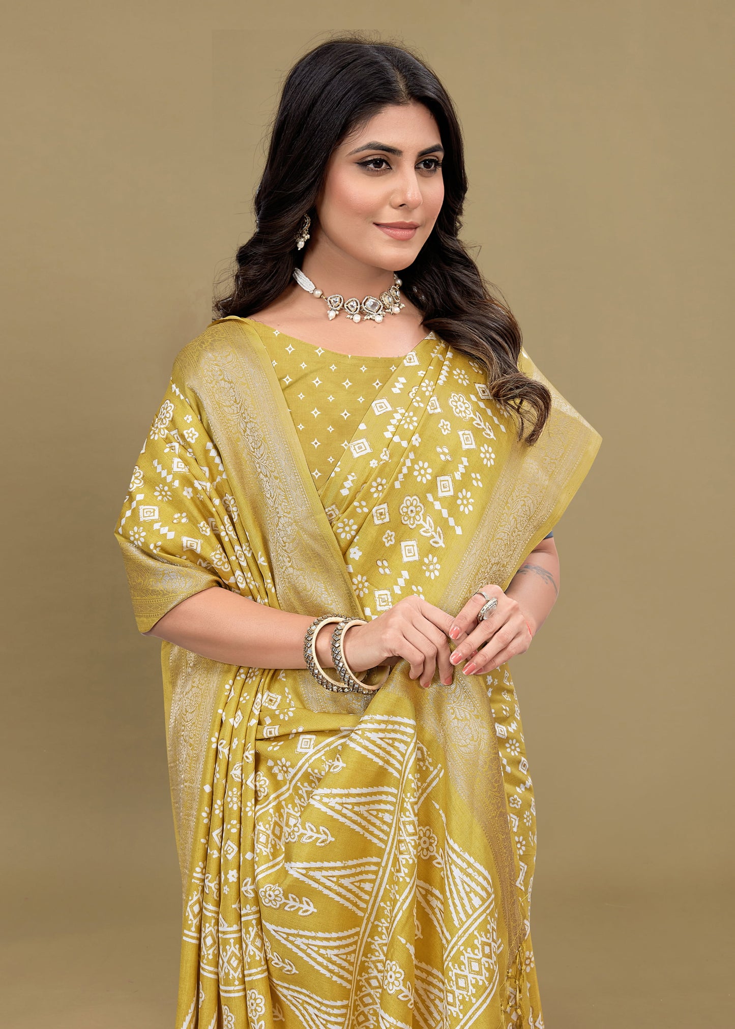 Graceful Lemon Yellow Saree with Ethnic Print, Foil Detailing, and Zari Woven Trim