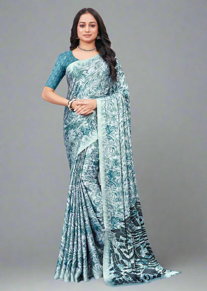 Modern Teal Blue Satin Saree Featuring Dynamic Abstract Patterns